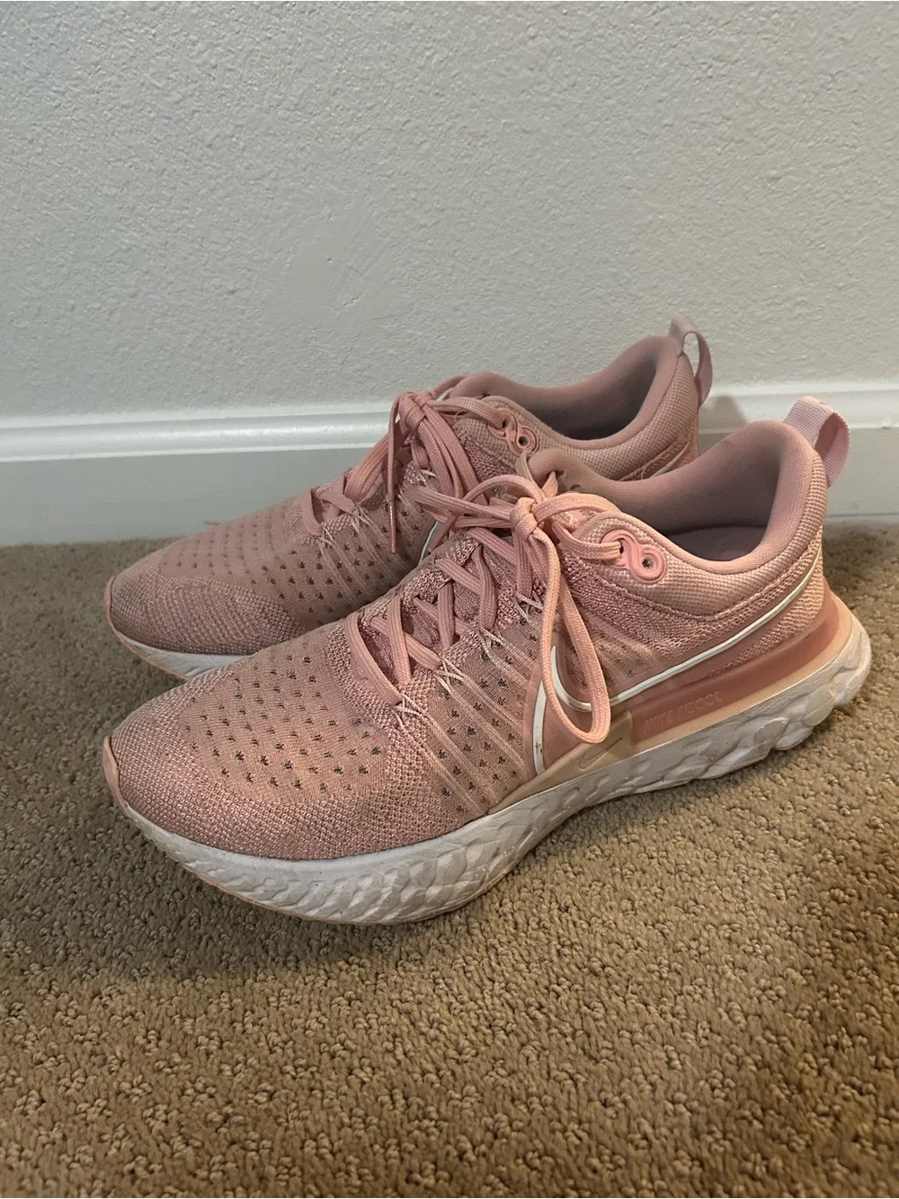 Nike Women's React Infinity Run Flyknit 2 Running Shoes in Pink Glaze